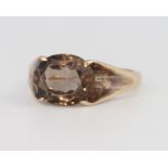 A 9ct yellow gold smoky quartz ring 3.3 grams, size J