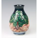 A Moorcroft baluster vase decorated Mamoura design by Sally Tuffin, circa 1993 impressed marks 18cm