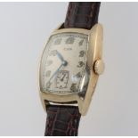 An Art Deco gold plated Elgin wristwatch with seconds at 6 o'clock on a leather strap This watch