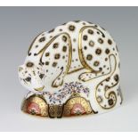 A Royal Crown Derby Imari pattern paperweight - snow leopard with gold stopper 12cm