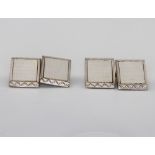 A pair of 9ct white gold mother of pearl rectangular cufflinks 3.9 grams