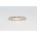 An 18ct white gold 8 stone diamond ring, approx.0.5ct, 4.5 grams, size N