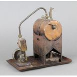 A copper and metal stationary steam engine with 8cm boiler