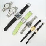 A collection of ladies and gentleman's wristwatches