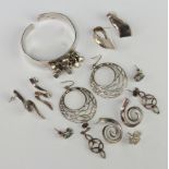A silver bracelet and minor silver jewellery, 76 grams