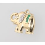 An 18ct yellow gold emerald and diamond elephant pendant, 2.1 grams, 18mm