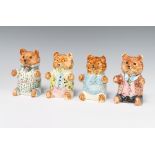 Four Rye Cinque Port Pottery figures of seated dressed bears 12cm