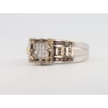 A 9ct white gold diamond ring, 5.4 grams, size O