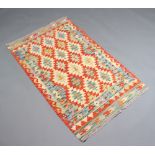 A brown and green ground Chobi Kilim runner 129cm x 82cm