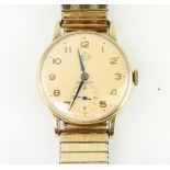 A gentleman's 9ct yellow gold Smiths Deluxe wristwatch with seconds at 6 o'clock contained in a 30mm