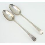A pair of George III silver table spoons with bright cut decoration London 1788, engraved