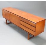 White & Newton Ltd of Portsmouth, a stylish 1960's teak sideboard, fitted a cupboard and cocktail