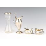 A silver urn shaped cream jug London 1922, a pair of salts and a silver rimmed vase 170 grams