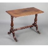 A Victorian rectangular mahogany stretcher table raised on a turned column with H framed stretcher