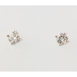 A pair of 18ct white gold brilliant cut diamond ear studs approx. 0.65ct