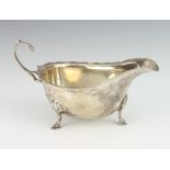 A silver sauce boat with S scroll handle and hoof feet Birmingham 1937, 112 grams