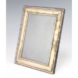A modern rectangular silver photograph frame 23cm x 18cm