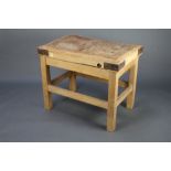 A rectangular metal bound butcher's block raised on a pine stand 74cm h x 92cm w x 61cm d