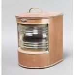 A copper ships masthead lantern, the bow front glass inscribed 24394 26cm h x 23cm w x 22cm d,