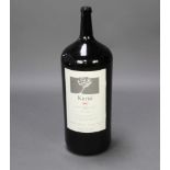 A 27000 millilitre bottle of Oasi Degli Angeli, Kurni 2003 Italian red wine, complete with