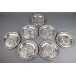 Seven German SKS limited edition pewter dishes decorated craftsman 21cm diam.