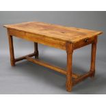 A 19th Century French fruitwood dining table fitted 2 long drawers, raised on square chamfered