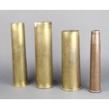 A Continental 90mm brass shell case together with 3 other brass shell cases