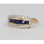 An 18ct yellow gold sapphire and diamond cocktail ring, the sapphires approx. 2ct, the brilliant cut