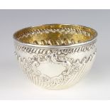 A repousse silver bowl with demi-fluted decoration London 1884, John Aldwinckle & Thomas Slater