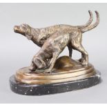 A 20th Century bronze figure group of two standing hounds raised on an oval black marble base 29cm x