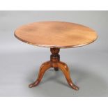 A 19th Century oval bleached mahogany snap top tea table raised on pillar and tripod base 61cm h x