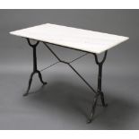 A rectangular Victorian style iron trestle table with white veined marble top 70cm h x 99cm w x 60cm