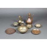 An Eastern copper spouted jug 35cm x 14cm, copper coffee pot 22cm x 15cm and a small collection of