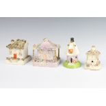 A Staffordshire pastel burner of a thatched cottage 9cm, ditto pink house 10cm, another 10cm and a