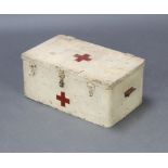 A military style rectangular metal twin handled first aid box with hinged lid, the interior