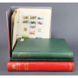 A red Windsor album of mint and used GB stamps, Victoria to Elizabeth II including a penny black and