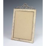 A Victorian rectangular silver photograph frame with wire work crest, monogrammed BCL, London