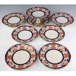 A 19th Century part dessert service decorated in the Imari pattern comprising 5 plates, 3 tazzas