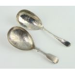 A Victorian silver caddy spoon with floral enngraved bowl London 1858 a later ditto 32 grams