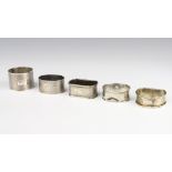 A silver engine turned napkin ring Sheffield 1931, 4 others, 92 grams