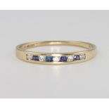 A 9ct yellow gold paste set ring, size S