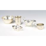 A Sterling silver sauce boat on scroll feet, a mug, beaker, bowl and dish, 280 grams