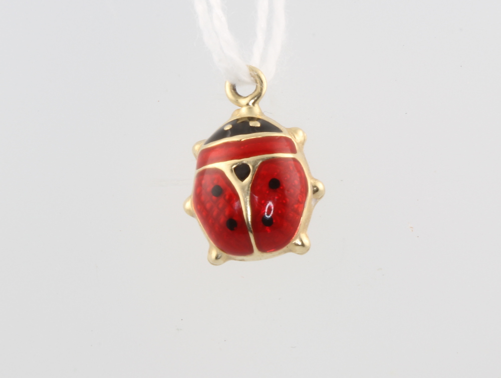 A 14ct yellow gold enamelled ladybird charm 0.7 grams