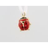 A 14ct yellow gold enamelled ladybird charm 0.7 grams