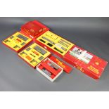 A Triang R7X electric train set boxed, 2 Triang OOH R161 gauge Hopper Chute sets boxed, a Triang