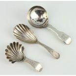 A George III silver caddy spoon by Hester Bateman London 1825 and 2 other caddy spoons 38 grams