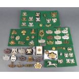 A quantity of Victorian and later Army cap badges