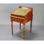 A Victorian mahogany clerk's desk with 3/4 gallery, the fall inset a leather writing surface,