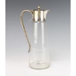 An Art Nouveau silver plated mounted glass claret jug 25cm