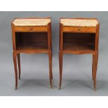 A pair of French Kingwood bedside cabinets with brown veined marble tops, fitted a drawer above a